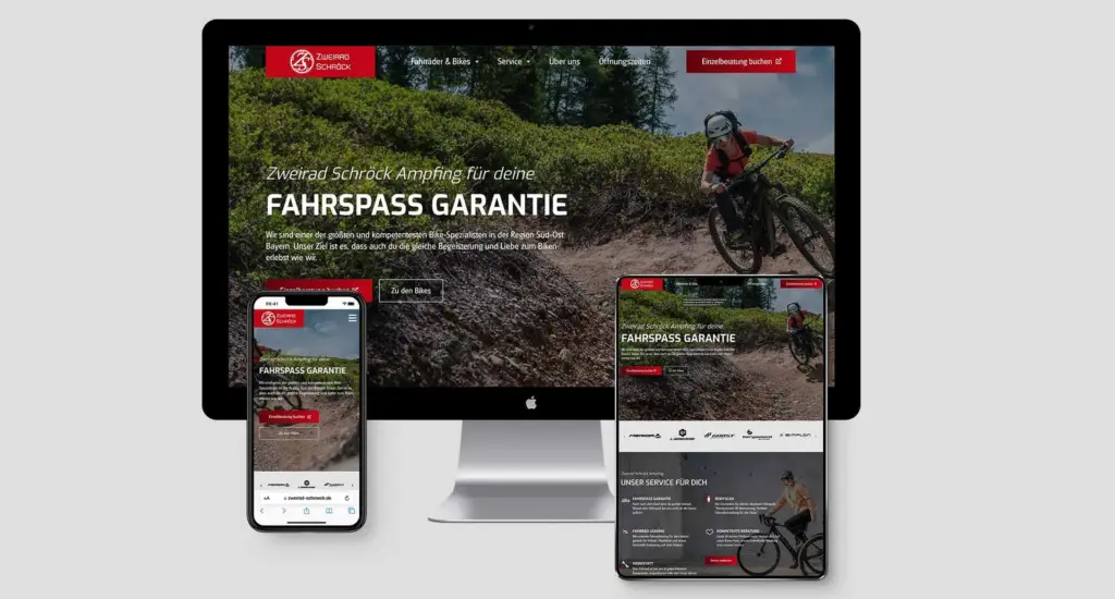 Die Website von Zweirad Schroick wird auf Desktop-PCs, Smartphones und Tablets angezeigt. Auf jedem Bildschirm ist ein Radfahrer auf einem Waldweg zu sehen. Der Text „Fahrspaß Garantie“ ist prominent platziert und weist auf den Fokus auf Radfahren und Outdoor-Aktivitäten hin.